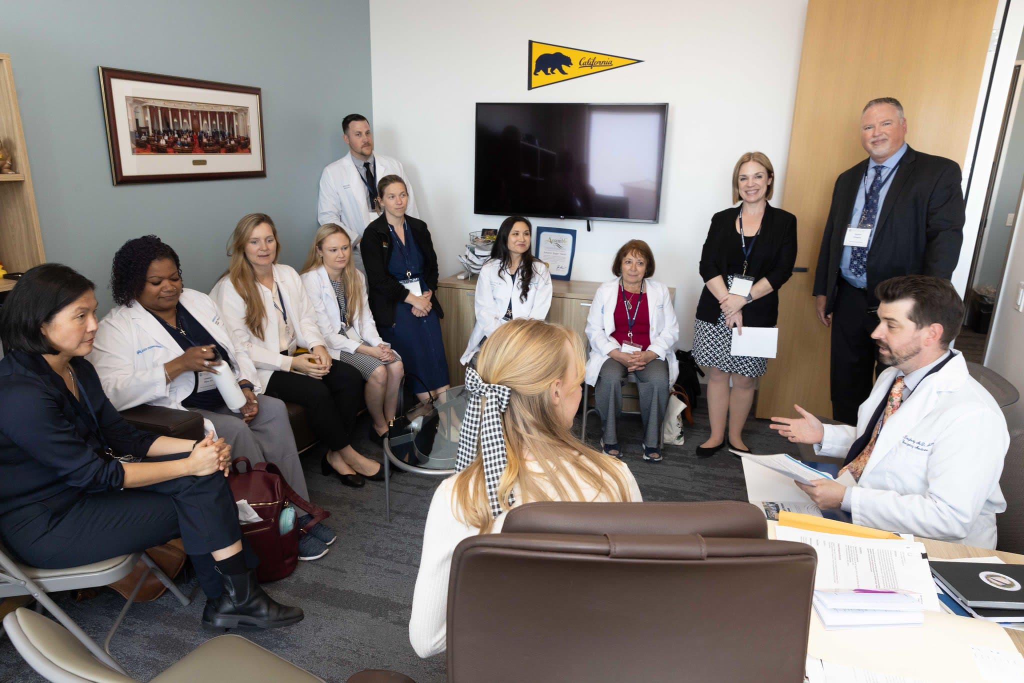 A group of people sitting in a room