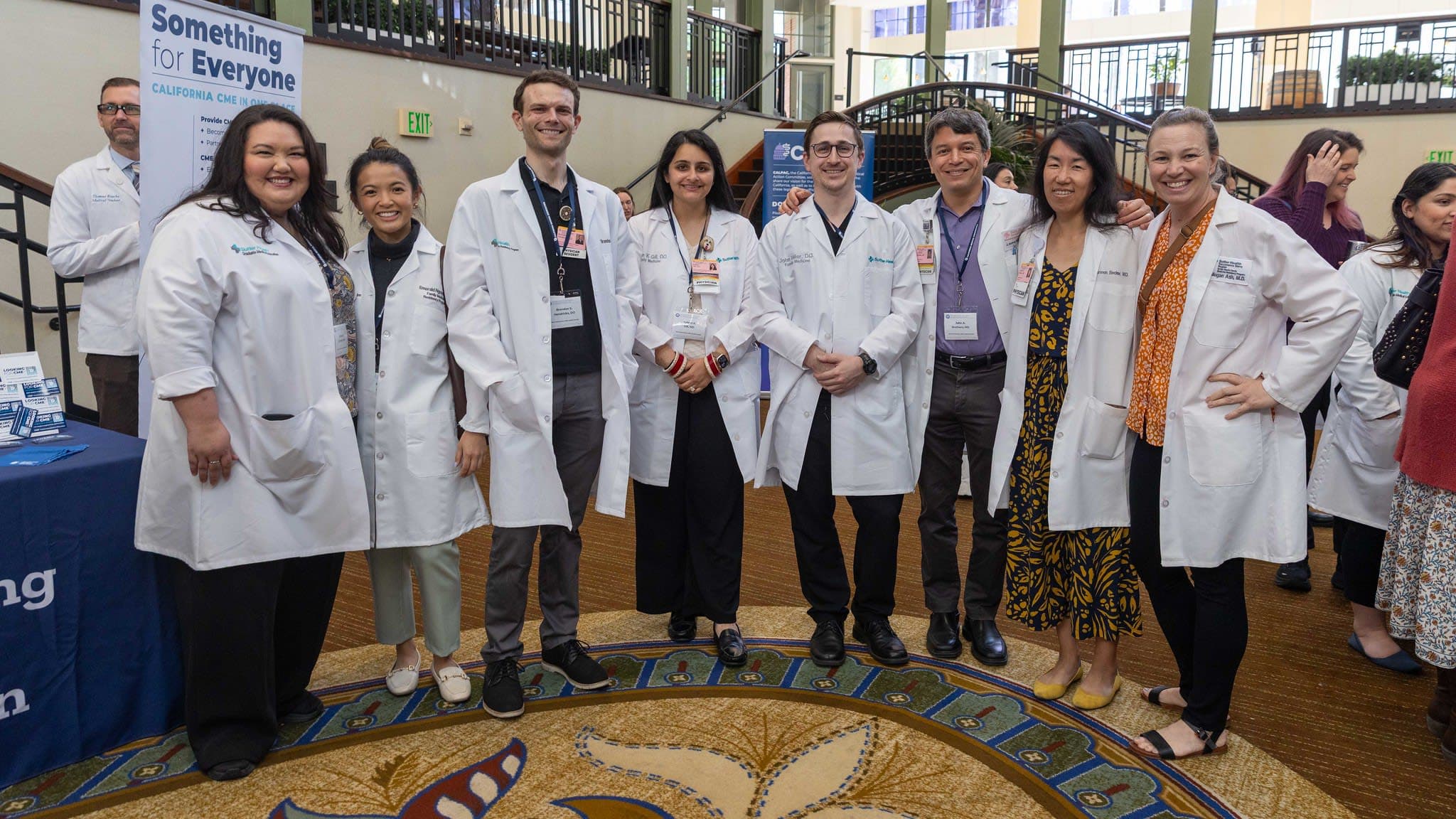A group of people in lab coats posing for a picture