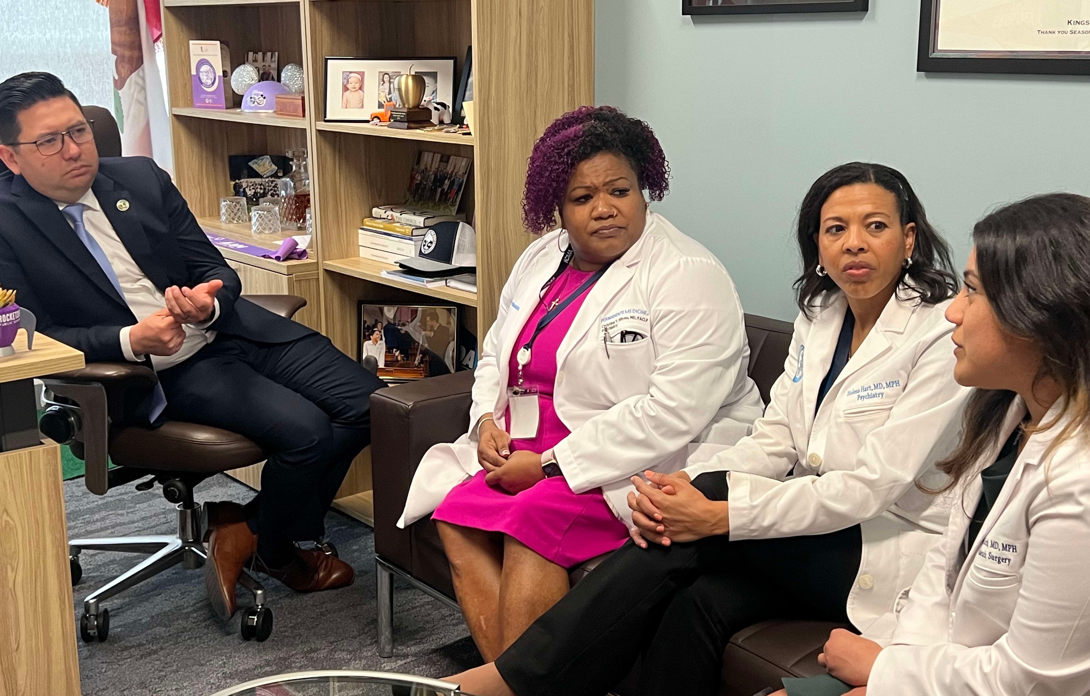 A group of people sitting in a room