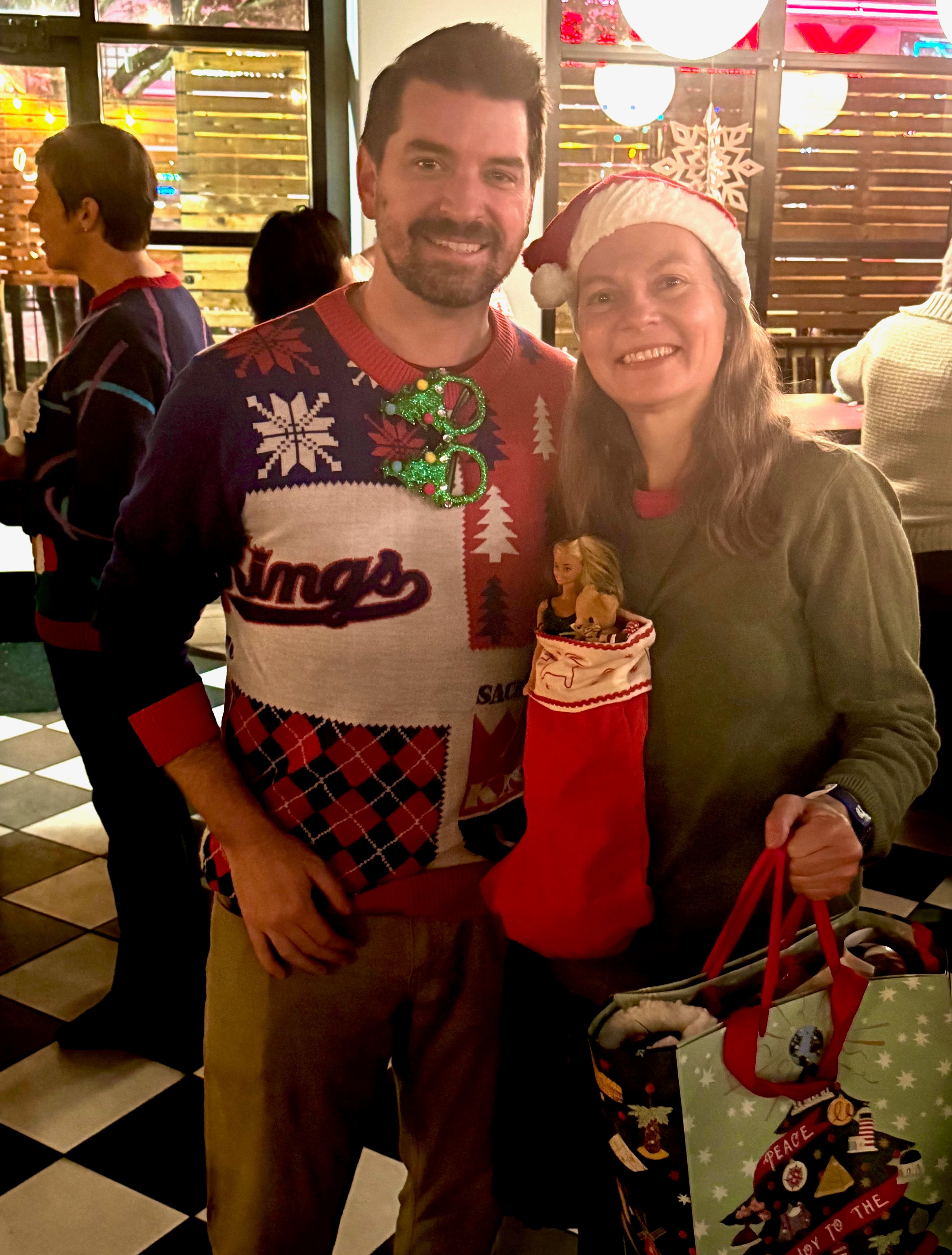 A man and a woman standing next to each other