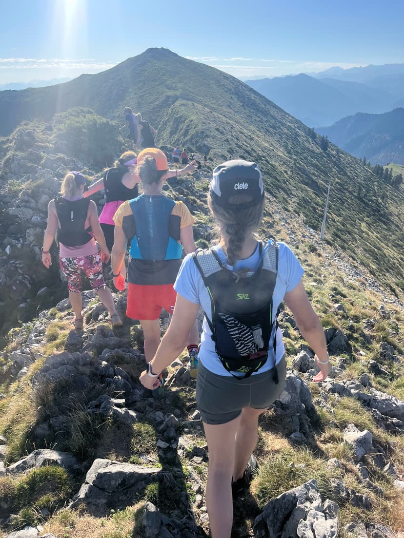 A group of people hiking up a mountain